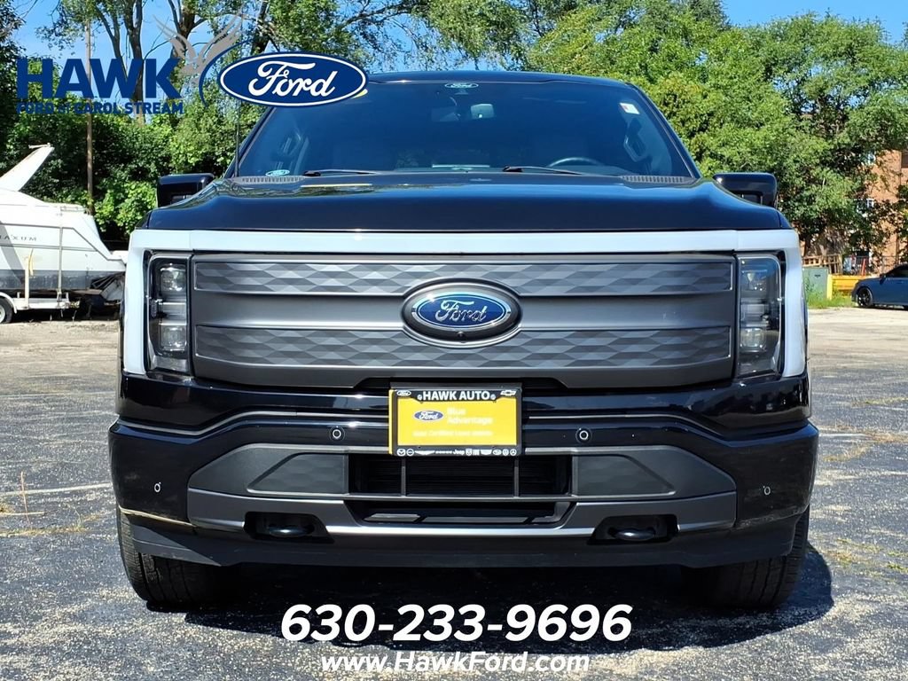 Used 2022 Ford F-150 Lightning Lariat with VIN 1FT6W1EV8NWG00093 for sale in Plainfield, IL