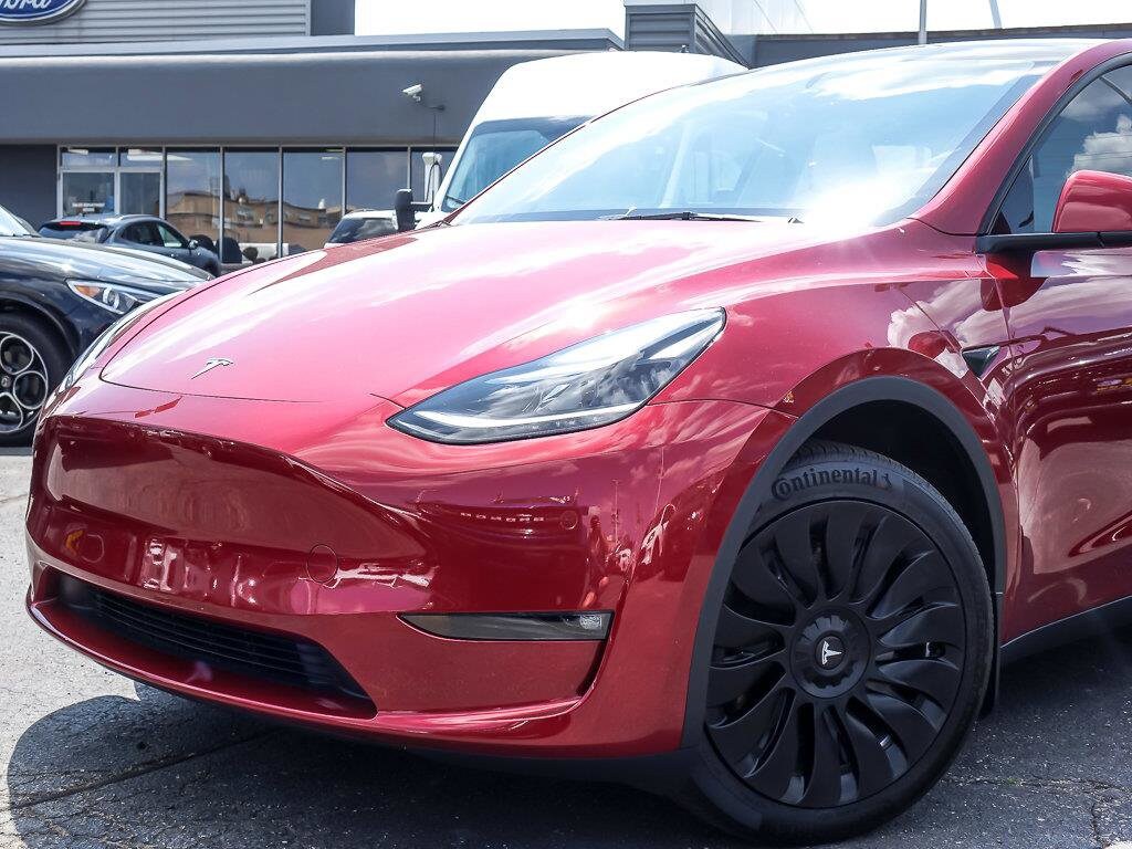Used 2024 Tesla Model Y Long Range with VIN 7SAYGDEE0RF033558 for sale in Plainfield, IL