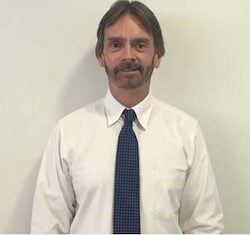 Staff member John Riley from 50e77b9bb83d