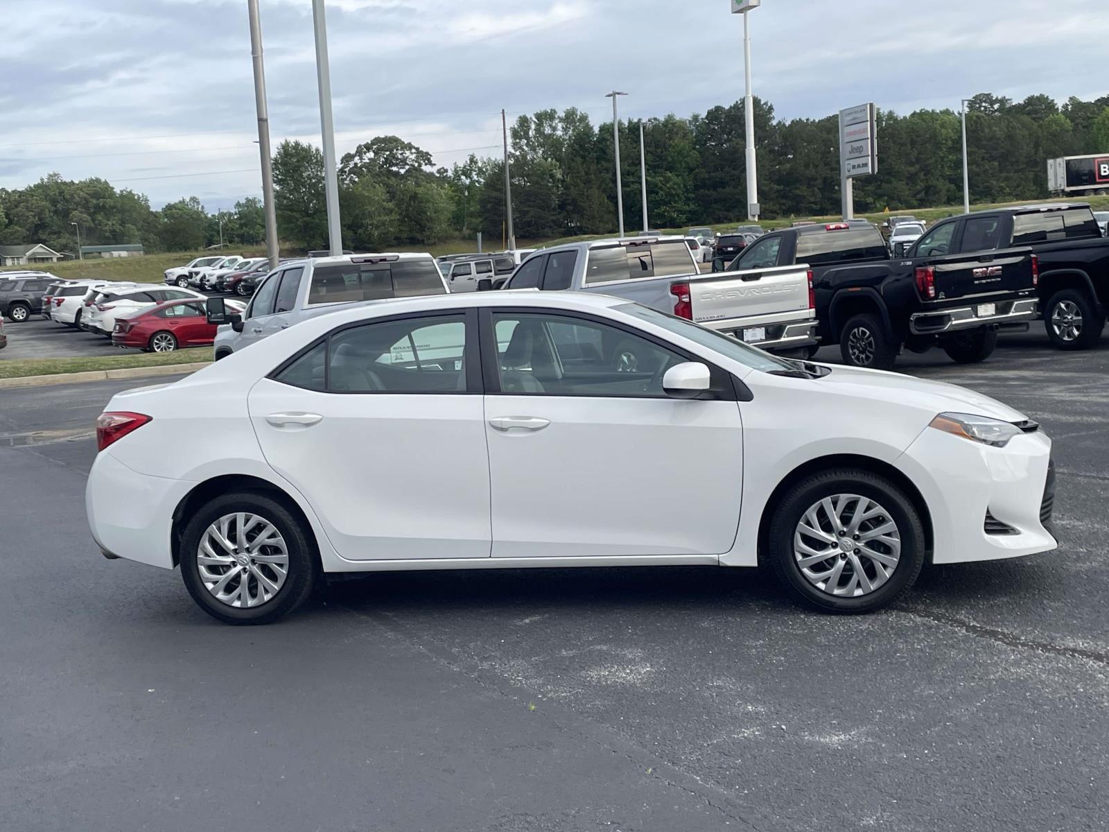 Used 2017 Toyota Corolla LE with VIN 5YFBURHE2HP733895 for sale in Alto, GA