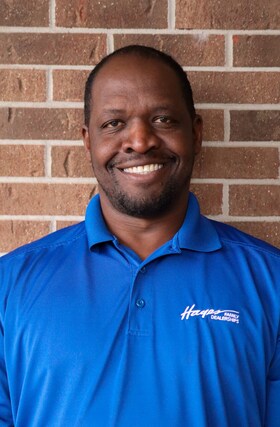 Staff member Abez Redwood from ID_2c3ec16483f7