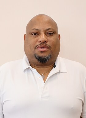 Staff member Tresphor "Tre" Chikumo from ID_2c3ec16483f7