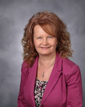 Staff member Carol Piper from ID_a84e1d9c2366