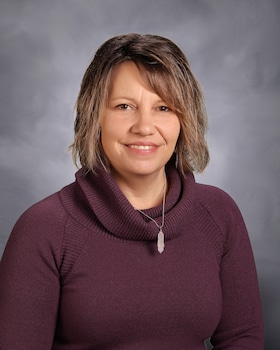 Staff member Angela Mead from ID_477ead46cbb9