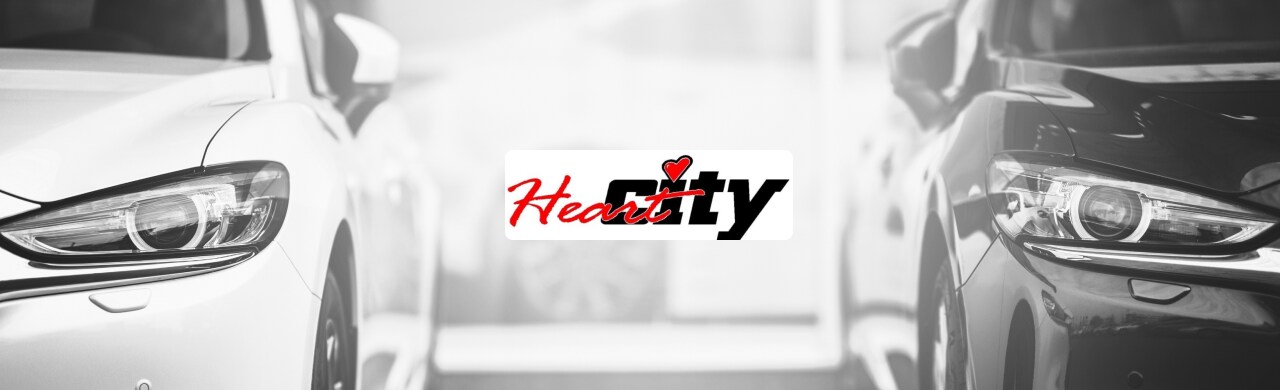 A wide selection of used cars is displayed at Heart City Toyota's lot in Elkhart, Indiana.
