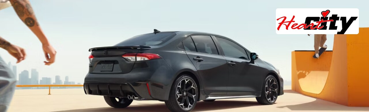 Toyota-Corolla-Compact-Efficient-and-Perfect-for-Your-Lifestyle.png Close-up of a sleek Toyota Corolla highlighting its modern design.