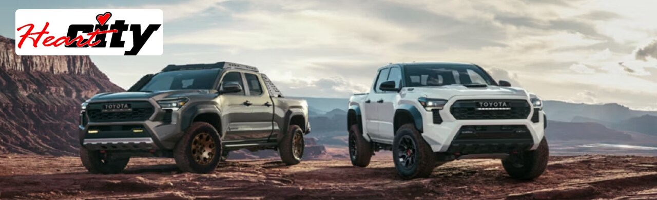 Toyota-Tacoma-Tough-Rugged-and-Ready-for-Every-Job.png Heart City Toyota dealership showcasing a lineup of Toyota Tacoma trucks in Elkhart, IN.