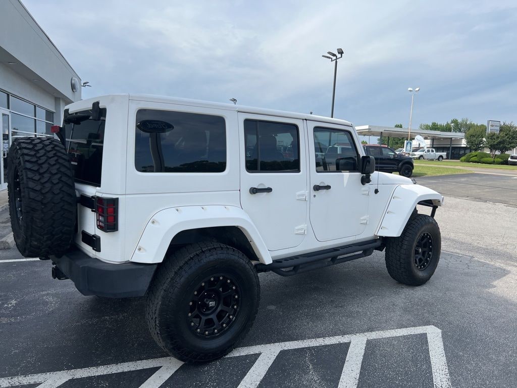 Used 2013 Jeep Wrangler Unlimited Sport SUV
