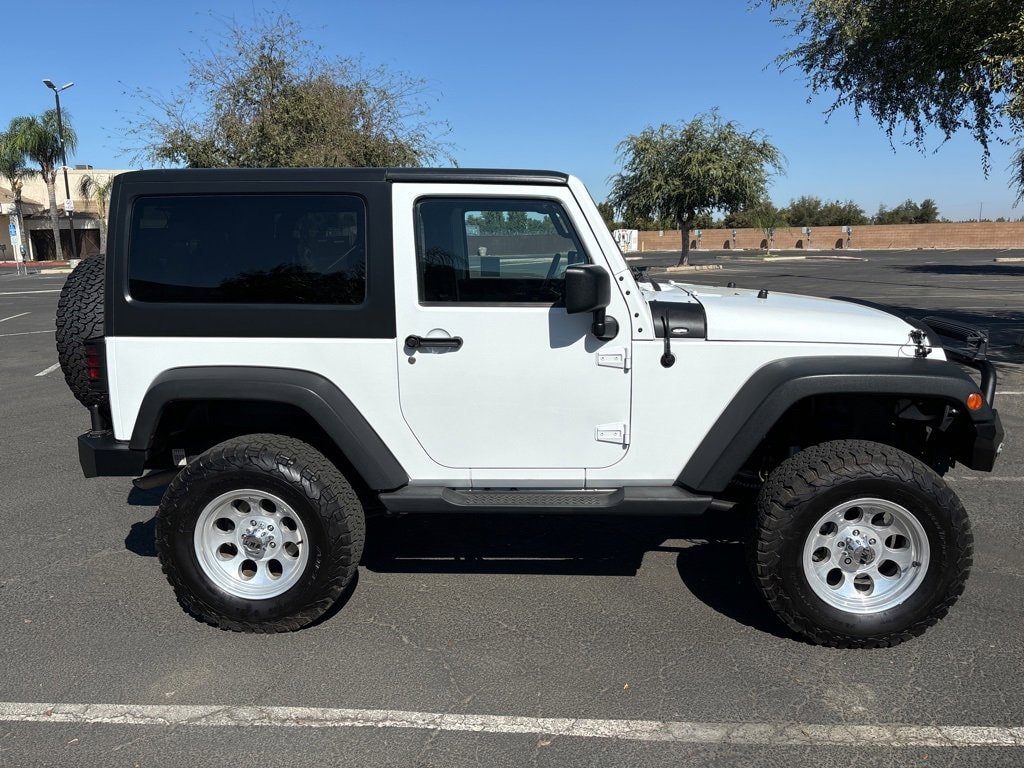 Used 2014 Jeep Wrangler Sport with VIN 1C4AJWAG0EL163057 for sale in Clovis, CA