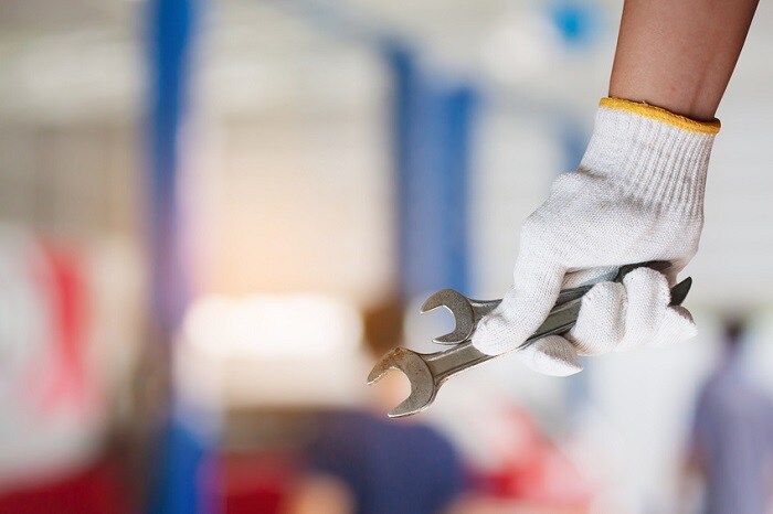 Mechanic_Holding_Wrench.jpg