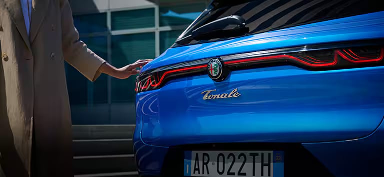 2024-alfa-romeo-tonale-rear-woman.png