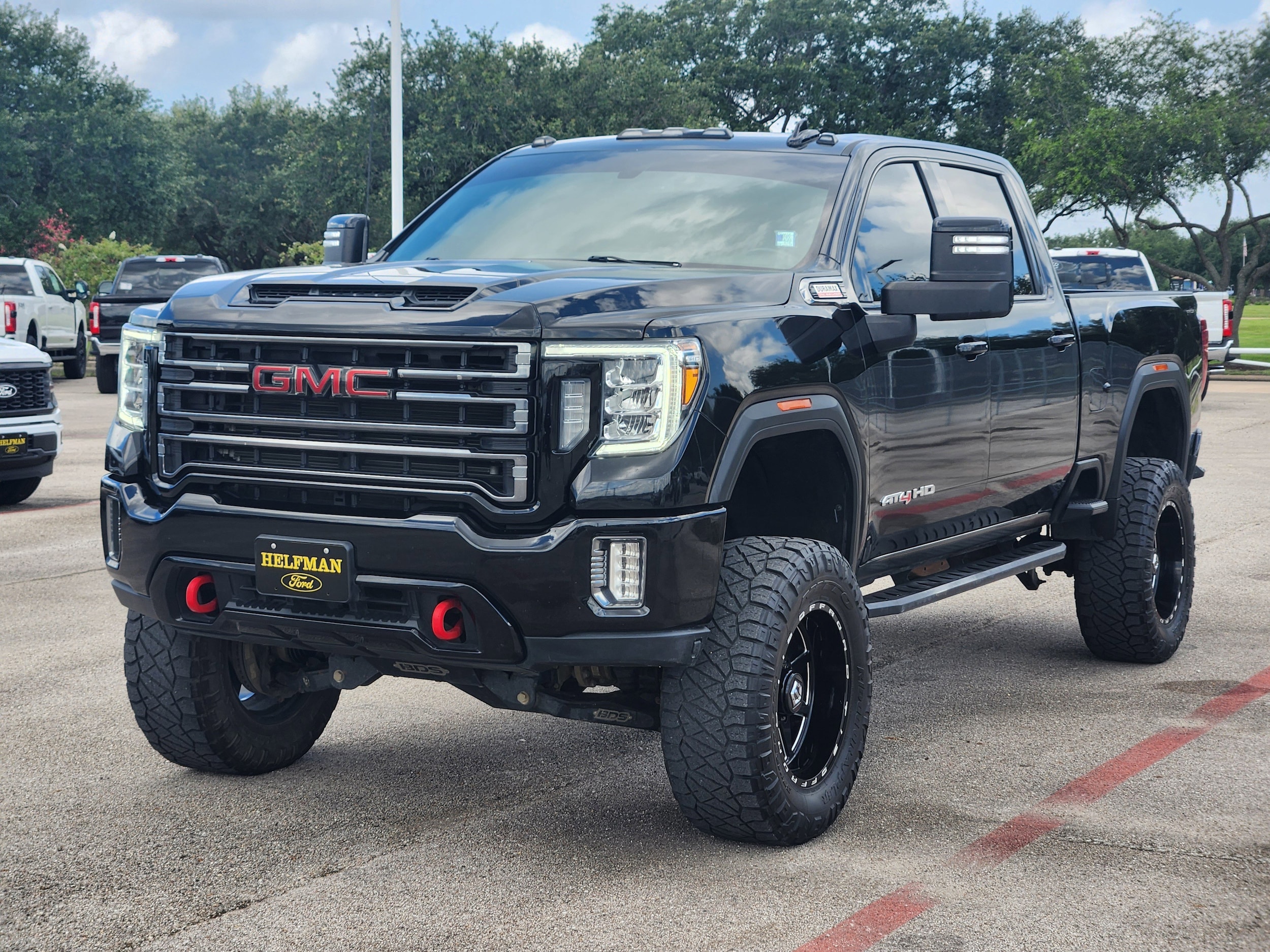 Used 2021 GMC Sierra 2500HD AT4 with VIN 1GT19PEY2MF312275 for sale in Stafford, TX