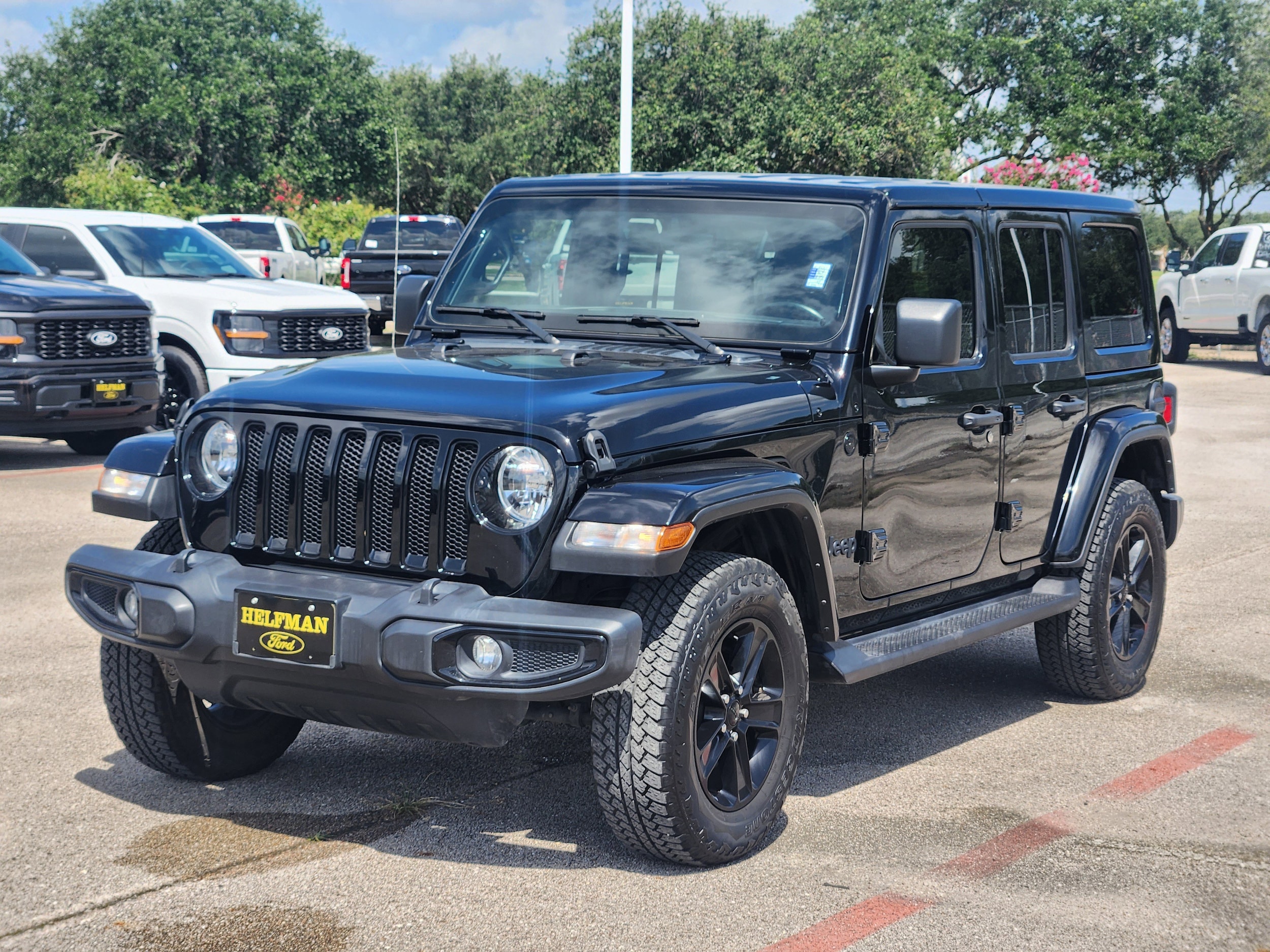 Used 2022 Jeep Wrangler Unlimited Sahara Altitude with VIN 1C4HJXEN4NW118537 for sale in Stafford, TX