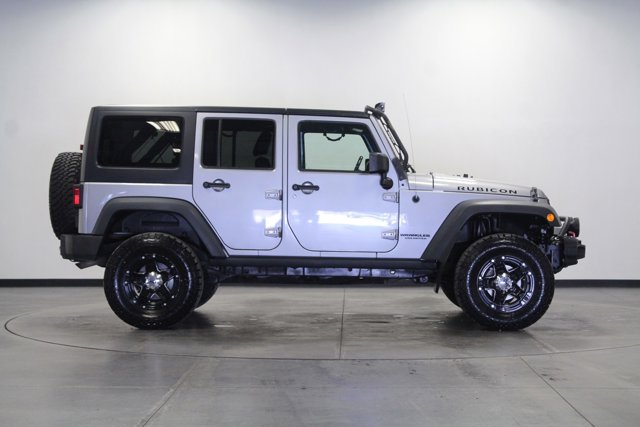 Used 2015 Jeep Wrangler Unlimited Rubicon with VIN 1C4BJWFG0FL773961 for sale in Pontiac, IL