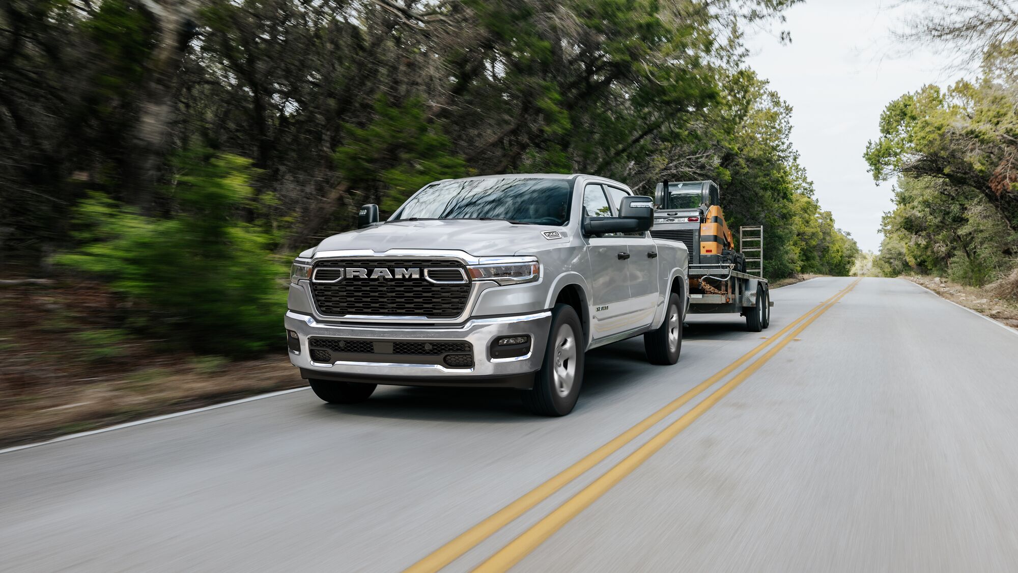 Ram 1500 on a road towing equipment