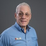 Staff member Eddie Roseman from ID_dd4a5bd9203d