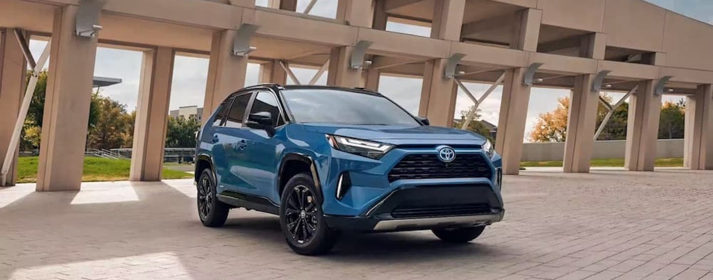 A blue 2023 Toyota RAV4 Prime is shown from the front at an angle.
