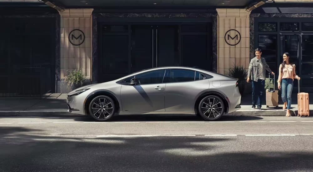 A grey 2023 Toyota Prius is shown from the side after leaving a car dealership in Charleston, SC.
