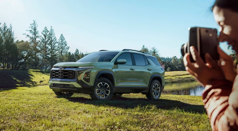 Green 2026 Chevy Equinox ACTIV parked off-road