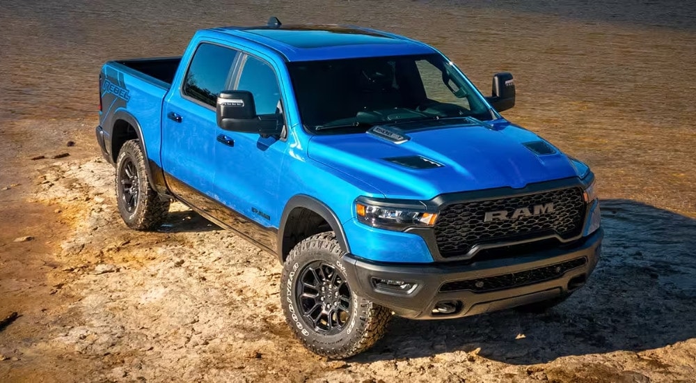 Blue 2026 Ram 1500 Rebel  parked off-road