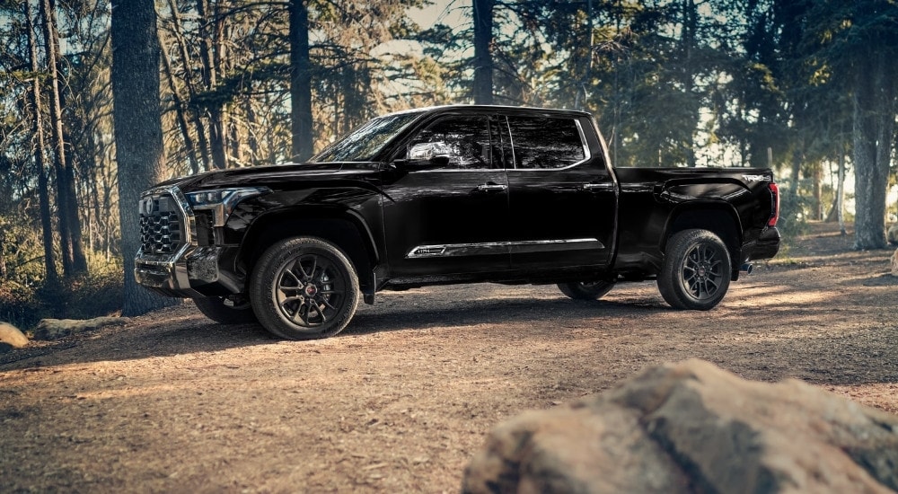 Black 2026 Toyota Tundra 1794 Edition parked near trees