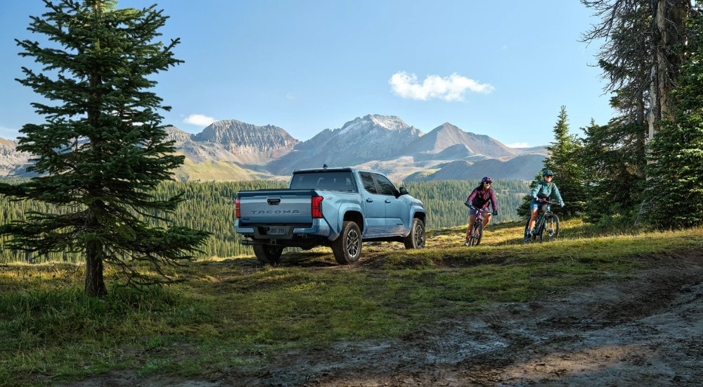 Blue 2026 Toyota Tacoma TRD Sport parked off-road