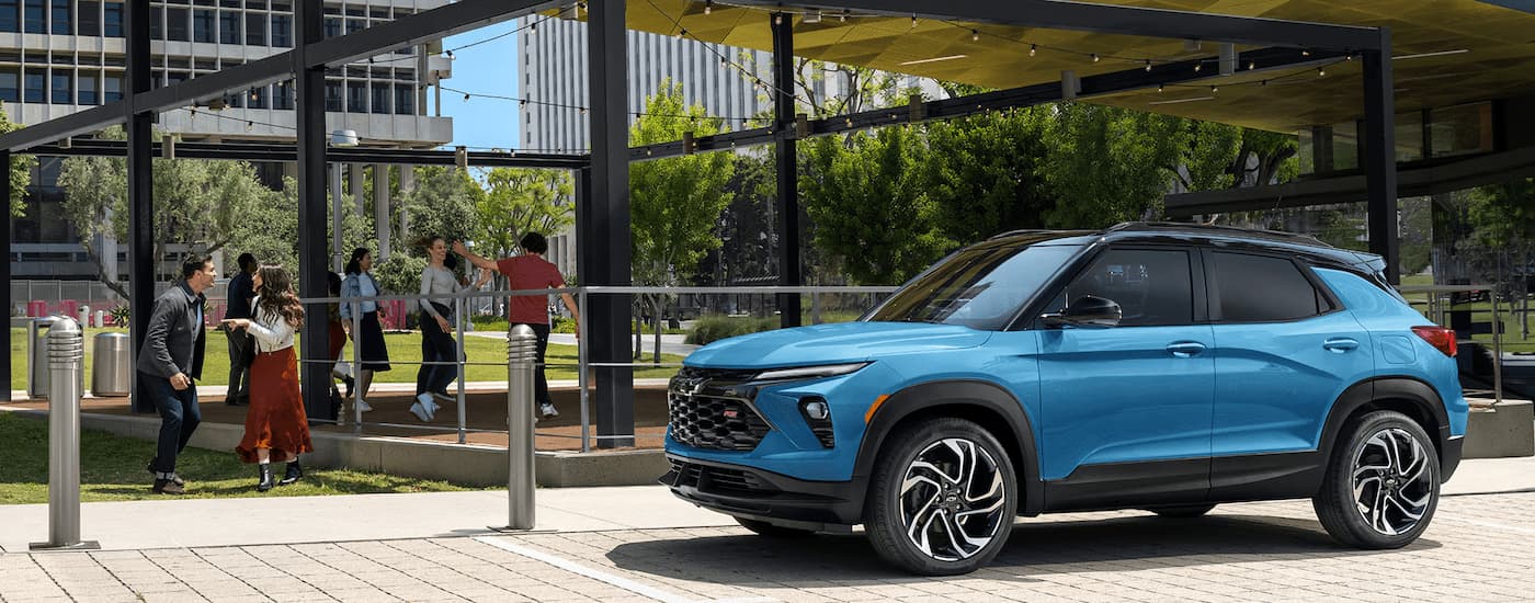Blue 2025 Chevy Trailblazer RS parked near dealer with cars for sale near Atlanta