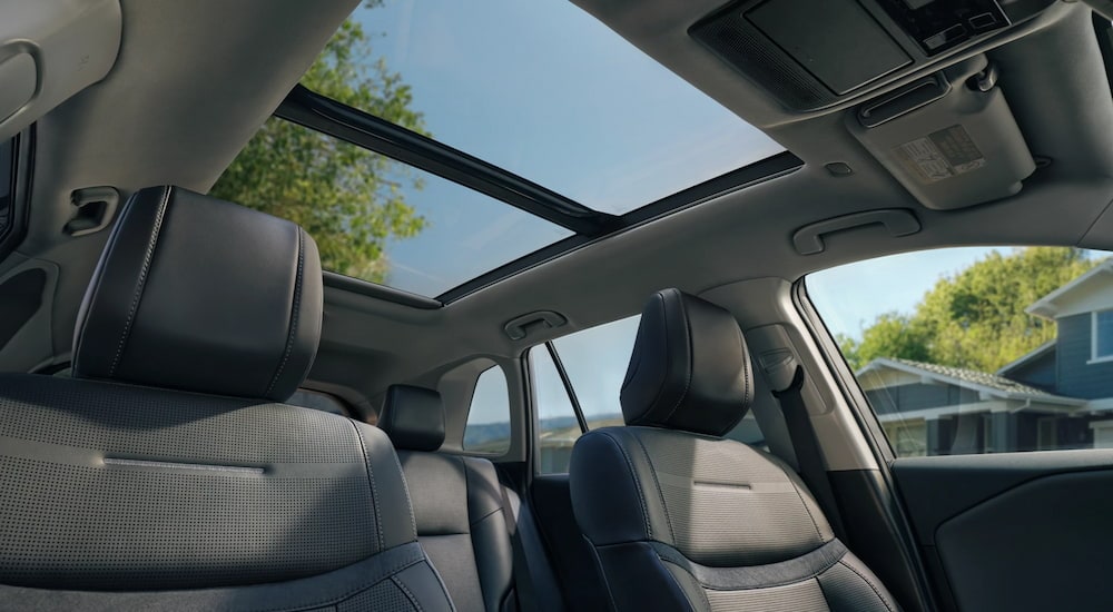Cars%20for%20Sale%20Near%20Morrisville%20-%202026%20Toyota%20RAV4%20-%20Interior%20copy.jpg Seats and sunroof inside a 2026 Toyota RAV4.