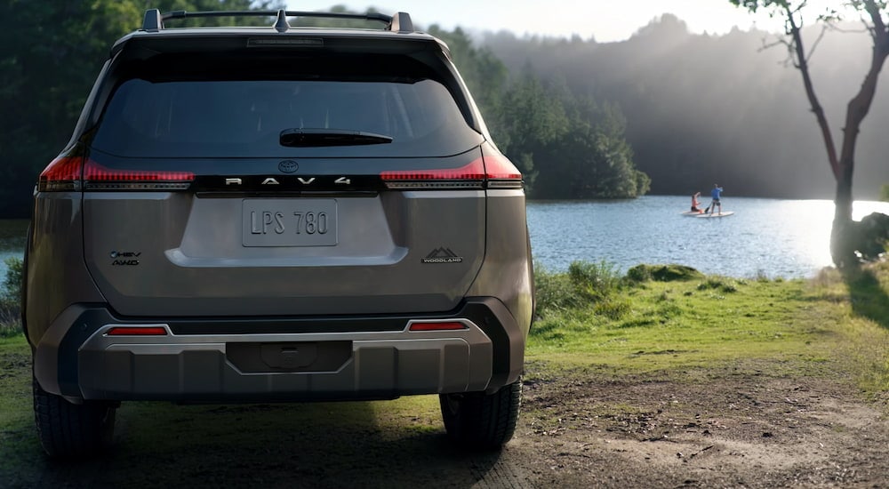 Cars%20for%20Sale%20Near%20Morrisville%20-%202026%20Toyota%20RAV4%20-%20Grey%202%20copy.jpg Grey 2026 Toyota RAV4 parked by a lake.