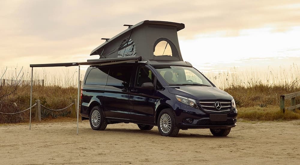 2024%20Mercedez-Benz%20Metris%20Getaway%20Van.jpg A black 2024 Mercedes-Benz Metris Getaway Van is shown parked off-road after viewing cargo vans for sale in Charlotte.
