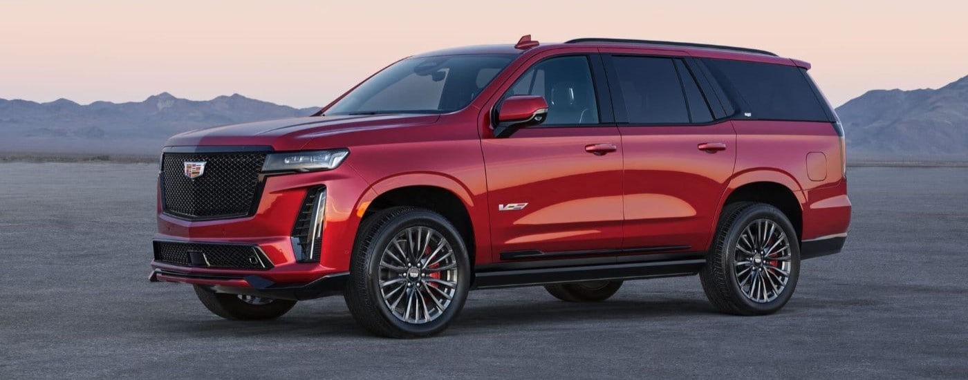 Red 2023 Cadillac Escalade V parked at an angle