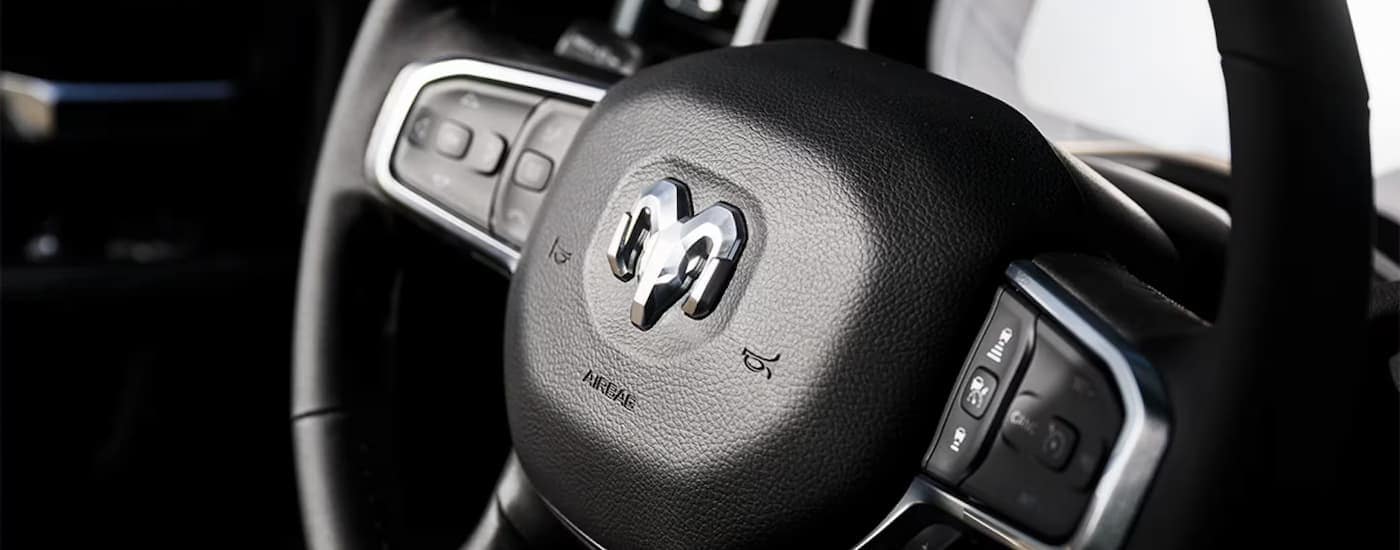 Steering wheel in a 2025 Ram 2500 truck for sale near Concord