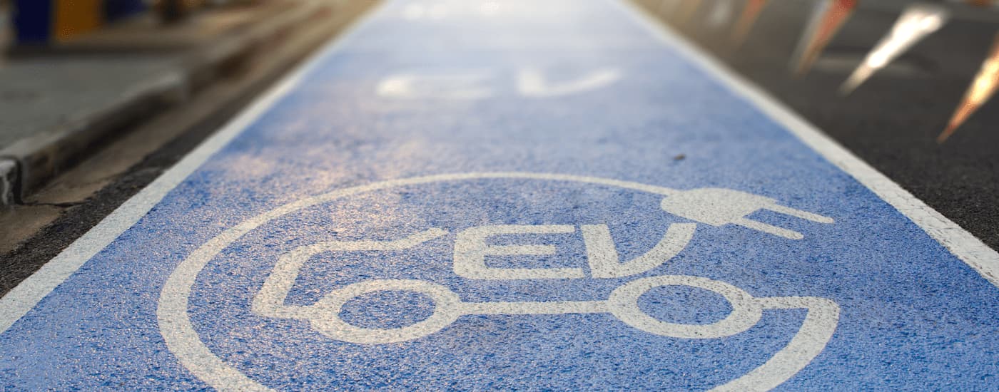 Electric vehicles for sale - ev lane.jpg A blue EV parking spot is shown.