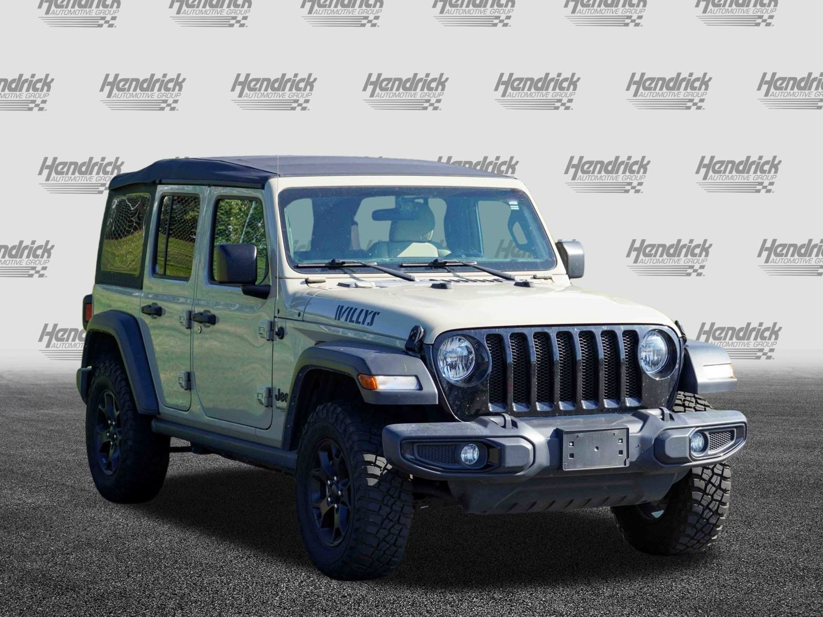 Used 2022 Jeep Wrangler Unlimited Willys Sport with VIN 1C4HJXDG5NW233022 for sale in Charlotte, NC