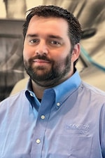 Staff member Charlie Cressi from ID_f5041f6a1624