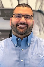 Staff member Austin Kail from ID_1441315ca605