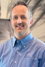 Staff member Jesse Walsh from ID_f5041f6a1624