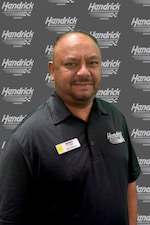 Staff member Darryl Ramjohn from ID_e446085f2921