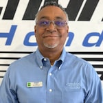 Staff member Gil Hamilton from ID_49d1a91a528b