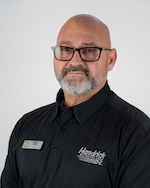 Staff member Cezar from ID_114150577a83