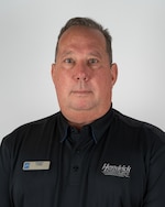 Staff member Charlie from ID_d994a9864c7b