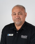 Staff member Mansur from ID_d994a9864c7b