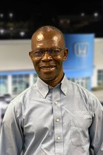 Staff member Matthew Okosun from ID_257a39fb0280