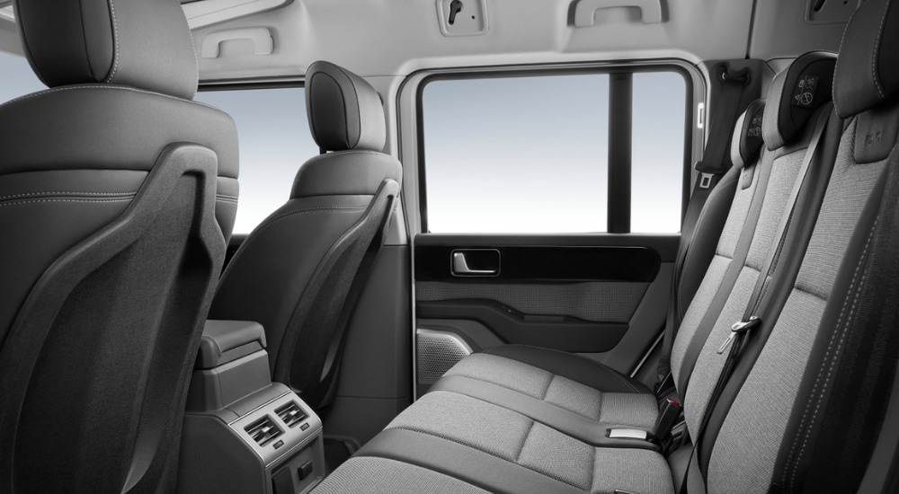 Black seating is shown in a 2025 INEOS Grenadier at a Grenadier dealer.