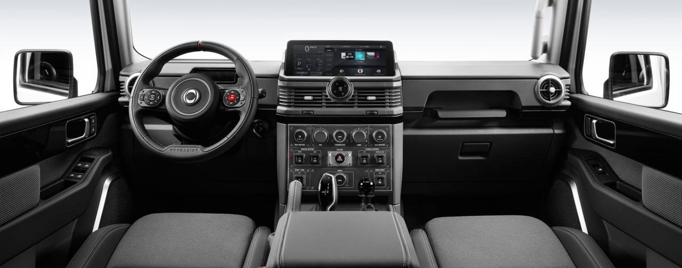 The black interior of a 2025 Ineos Grenadier is shown.