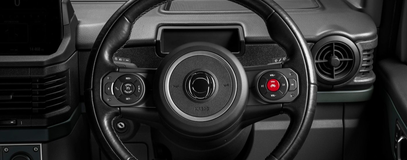 Close-up of t he steering wheel in a 2025 INEOS Grenadier 1924.