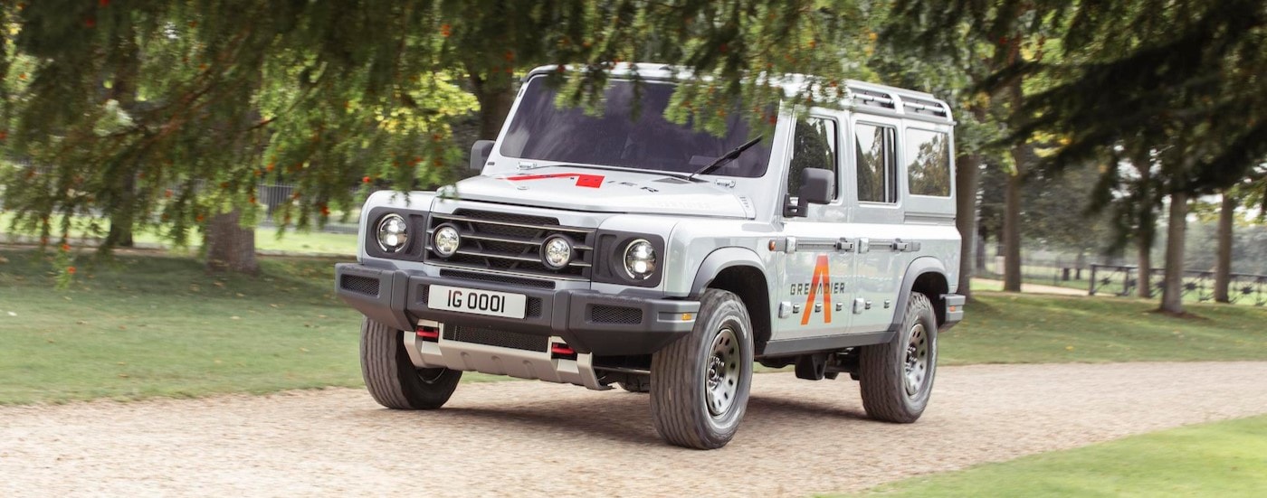 A gray INEOS Grenadier driving on a path.