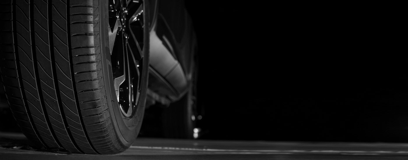 Close-up of a tire on a vehicle.