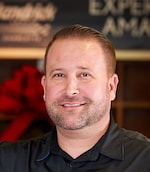 Staff member JUSTON TUCKER from ID_3f88a232dd5e