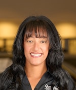 Staff member Isa Rodriguez from ID_f7d8c968bc46